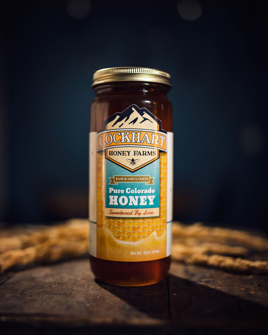 22oz glass jar of honey from Lockhart Honey Farms